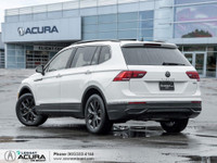 Finished in a Pure White exterior that complements the Black leatherette interior, standing on a set... (image 4)
