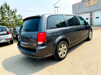 The 2017 Dodge Grand Caravan SXT SE is a popular minivan known for its spacious interior and reliabl... (image 7)