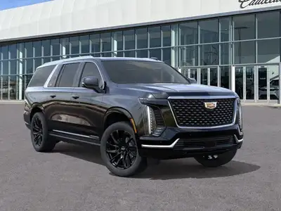 The 2025 Cadillac Escalade ESV Premium Luxury 4WD, presented in classic Black Raven with a striking...