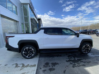 The 2025 Chevrolet Silverado EV Extended Range LT in Summit White is a groundbreaking and capable al... (image 9)