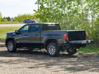 The 2023 GMC Sierra 1500 AT4 combines rugged performance with refined design, powered by a commandin... (image 5)