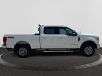 Looking for towing power and a truck that packs a punch? This WHITE Ford Super Duty pickups offer a... (image 5)