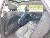 Experience the commanding presence and versatile functionality of this 2015 Hyundai Santa Fe XL Luxu... (image 3)