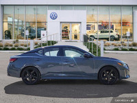 This Nissan Sentra delivers a Regular Unleaded I-4 2.0 L/122 engine powering it's sleek transmission... (image 5)