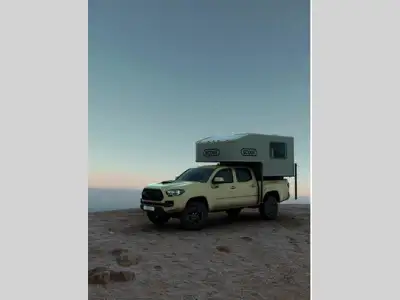 Adventure LP Scout Yoho truck camper highlights: Dinette Lounge Portable Power Station Stainless Sin...