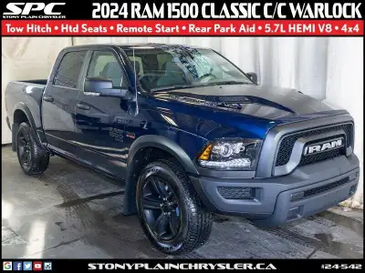 This 2024 Ram 1500 Classic Crew Cab Warlock 4x4 pickup truck with heated seats, tow hitch, 5.7L HEMI...