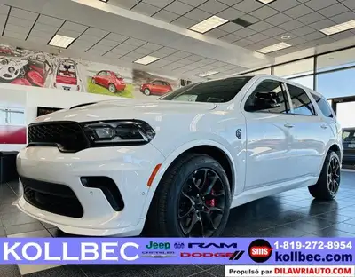 This Dodge Durango boasts a Intercooled Supercharger Premium Unleaded V-8 6.2 L/376 engine powering...