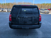 The 2020 Chevrolet Suburban Premier in Black with a Jet Black interior is a top-of-the-line full-siz... (image 6)