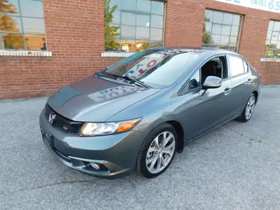 4DR CIVIC SI SEDAN 6 SPEED MANUAL SUNROOF NAVIGATION ALLOYS AND FULLY CERTIFIED INCLUDED IN PRICE.TA...