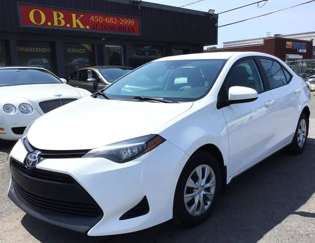2018 TOYOTA Corolla L -AUCUN ACCIDENT-BAS KM-DEMARREUR A DISTANC in Cars & Trucks in Laval / North Shore
