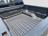 This 2025 GMC Canyon in Onyx Black is equipped with 4WD and Turbocharged Gas I4 2.7L/ engine. The GM... (image 9)