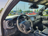 Check out this 2020 Toyota Tacoma 4x4 Double Cab Auto with 59,334 KMS, finished in a sleek White ext... (image 9)