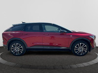 This 2025 Cadillac OPTIQ in Radiant Red Tintcoat is equipped with AWD and Electric engine. Check out... (image 5)