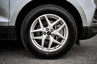 This 2024 Ford Edge is for sale today. This SUV has 56,362 kms. It's silver in colour and is complet... (image 6)
