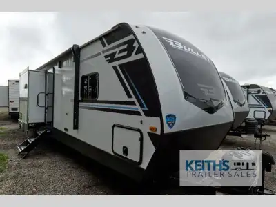 Keystone Bullet travel trailer 330BKQ highlights: Dual Entry Doors Exterior Kitchen Fireplace Triple...