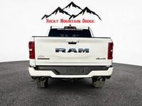 The Ram 1500 Big Horn 4x4 Crew Cab 5'7" Box in a stunning White exterior and matching White interior... (image 3)