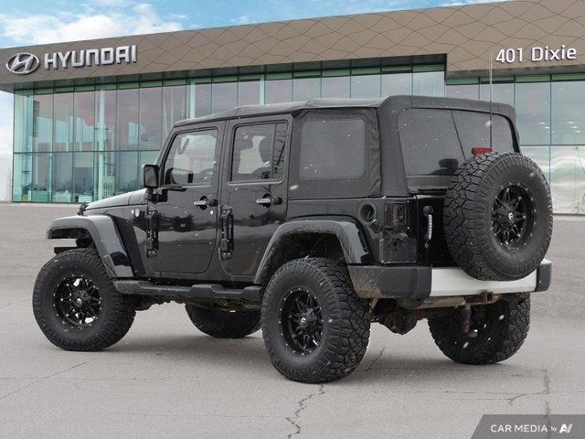 2013 Jeep Wrangler Unlimited Sahara in Cars & Trucks in Mississauga / Peel Region - Image 3