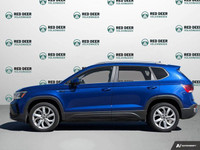 This 2022 Volkswagen Taos Comfortline is a practical and efficient compact SUV that offers smooth pe... (image 3)