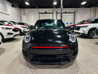 Enjoy a luxurious open-air joyride with our 2020 MINI Cooper Convertible John Cooper Works presented... (image 7)