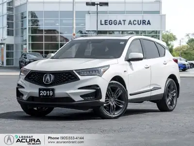CLEAN CARFAX, LOW KM Glazed in a White Diamond Pearl exterior that is completed with Red leather w/...