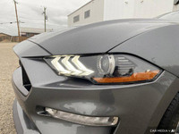 This Carbonized Grey Metallic 2022 Ford Mustang GT is an iconic sports car that delivers exhilaratin... (image 7)