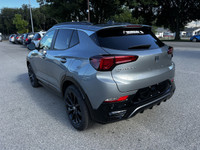 With exciting times ahead, our 2026 Buick Encore GX Sport Touring AWD in Moonstone Gray Metallic sta... (image 4)