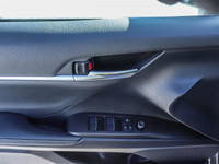 CAMRY XSE FEATURES AWD, 19-INCH WHEELS, AND DUAL EXHAUST. INSIDE, IT OFFERS A LEATHER-TRIMMED INTERI... (image 6)