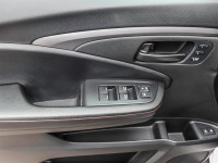 The 2023 Honda Passport TrailSport in stunning white is an all-wheel drive powerhouse designed for b... (image 7)