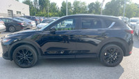 Le Mazda CX-5 Touring 2021 est un VUS compact qui allie style, performance et confort. Positionné da... (image 9)