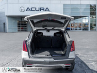 Finished in a Crystal White Tricoat exterior that complements the Black leather interior, standing o... (image 5)