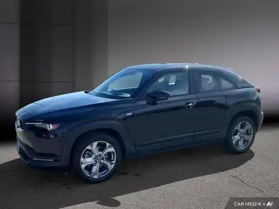 Le Mazda MX-30 EV GS 2024 est le premier véhicule entièrement électrique de Mazda, offrant une expér...