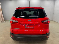 Looking for a fun and fuel-efficient ride to navigate Canadian streets? Check out this vibrant red 2... (image 4)
