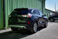 This 2022 Ford Escape is for sale today. This SUV has 92,849 kms. It's black in colour . It has a 8... (image 2)