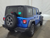 Recent Arrival! Odometer is 9891 kilometers below market average! Hydro Blue Pearl Coat 2023 Jeep Wr... (image 1)