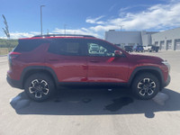 The 2025 Chevrolet Equinox ACTIV, dressed in a bold Radiant Red exterior with a distinctive Maple Su... (image 9)