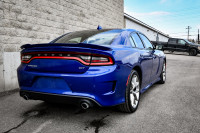This 2021 Dodge Charger is for sale today. This sedan has 96,652 kms. It's blue in colour . It has a... (image 2)