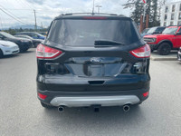 This 2019 Ford Escape SE has a Tuxedo Black exterior and Charcoal Black seats with seating for 5. Eq... (image 5)