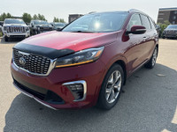 This 2019 Kia Sorento is finished in striking Passion Red Metallic with a refined Black interior, of... (image 3)