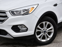 The 2018 Ford Escape SE is a compact SUV that, offers a mix of practicality and sportiness. The inte... (image 1)