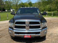 Tough, reliable, and built to handle anything you throw its way — this 2017 Ram 3500 SLT Dually with... (image 8)