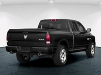 The 2018 Ram 1500 Night 4x4 Quad Cab is a bold statement in performance and design, sporting a domin... (image 2)
