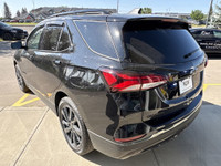 The 2022 Chevrolet Equinox RS brings a bold and athletic look with its Mosaic Black Metallic paint,... (image 5)