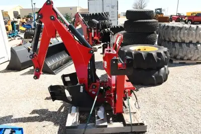 (UNUSED) MASSEY FERGUSON BACKHOE ATTACHMENT. SIDE STABILIZERS, CONTROLS, NO BUCKET. NO BRACKETS. STO...