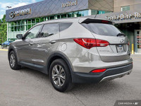 Experience the refined comfort and capable all-wheel drive of this 2016 Hyundai Santa Fe Sport Premi... (image 2)