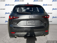 WAS: $35879 NOW: $29998 plus taxes and licensing feesExplore the 2023 Mazda CX-5 GX: A Perfect Blend... (image 4)