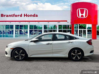 Experience the refined performance and sophisticated style of this 2017 Honda Civic Sedan Touring. T... (image 1)