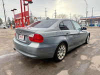 Discover the 2006 BMW 328i Coupe, a luxury vehicle that offers a perfect blend of performance, style... (image 4)