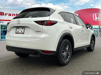 Experience the smooth handling and confident all-wheel drive of this 2021 Mazda CX-5 CX5TRXA. With o... (image 5)