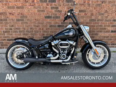 SUPER COOL and CUSTOM Fat Boy with a Trask two-into-one pipe, Kodlin solo seat, custom rear fender,...