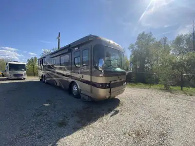 Quad Slide, Rear Wardrobe, Queen Bed Slideout w/Nightstands & Closet, Dresser, TV, Wash/Dryer Opt.,...
